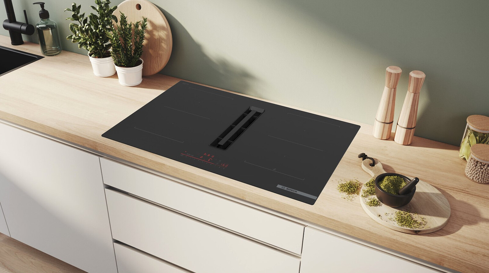 plyta-indukcyjna-zintegrowana-z-wyciagiem-bosch-serie-6-pvq811h26e-w-kuchni.jpg